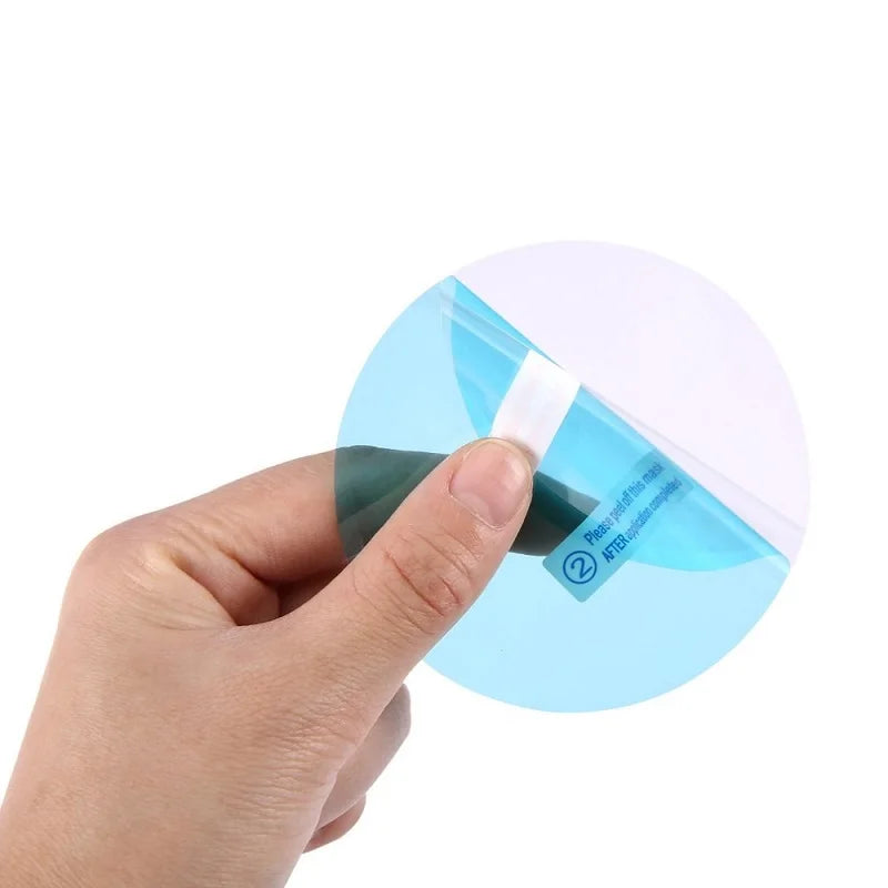 Showlu Smart General car rearview mirror anti-fog rainproof film set showing clear, weather-resistant film for improved visibility.