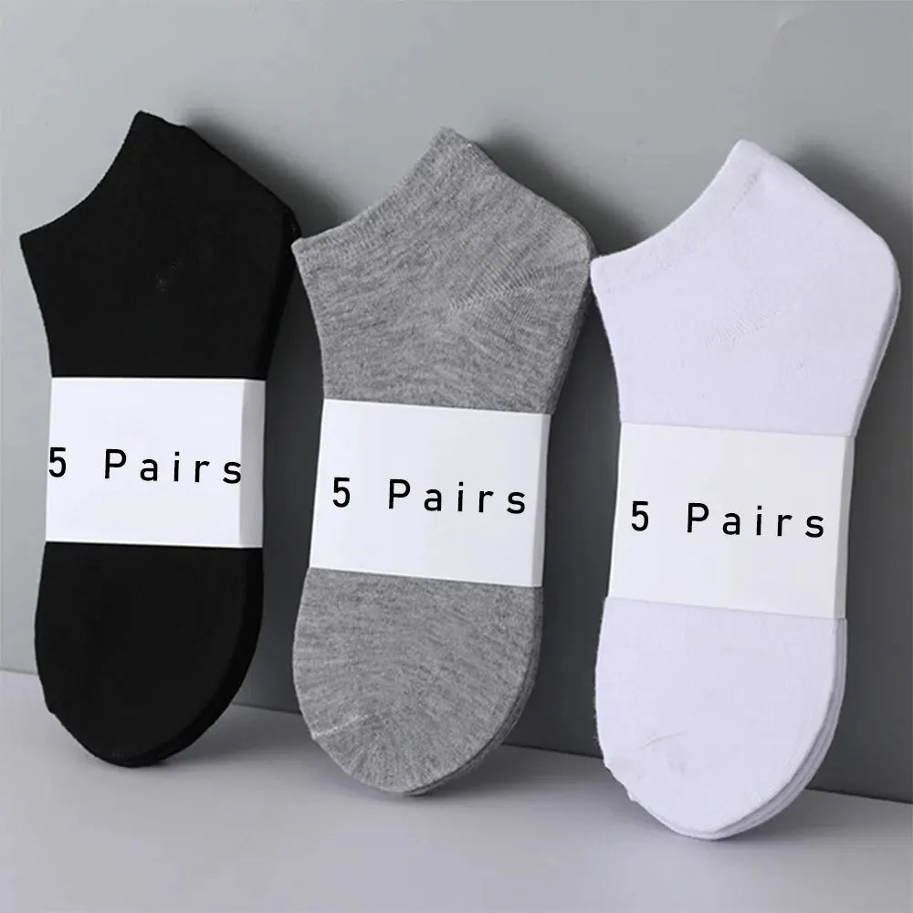 Five pairs of Showlu Fashion low cut boat socks in solid colors, breathable, anti-slip, no-show ankle socks for women and men.