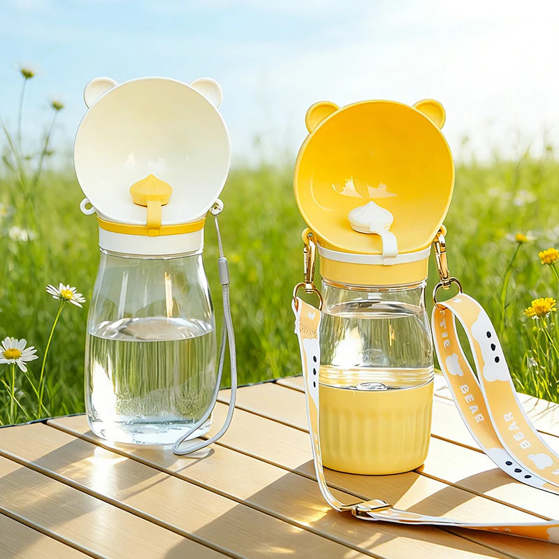 Holapet 2-in-1 portable dog water bottle with leak-proof travel dispenser, compact and easy to carry for outdoor walks.