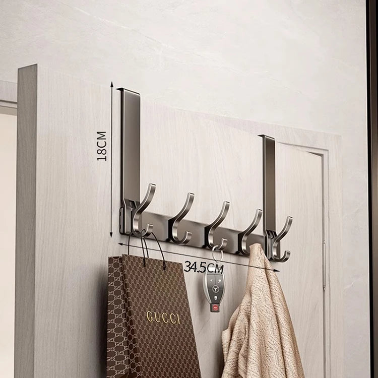 Wall-mounted multi hooks by Showlu Smart General, showing a set of versatile hooks attached to a wall for organizing keys and accessories.