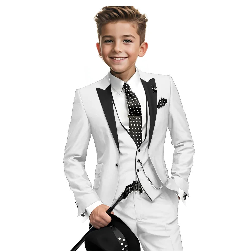 Navy blue boys' tuxedo set with blazer, vest, and pants, formal wedding boy suit for ages 2-16, shown on a hanger.
