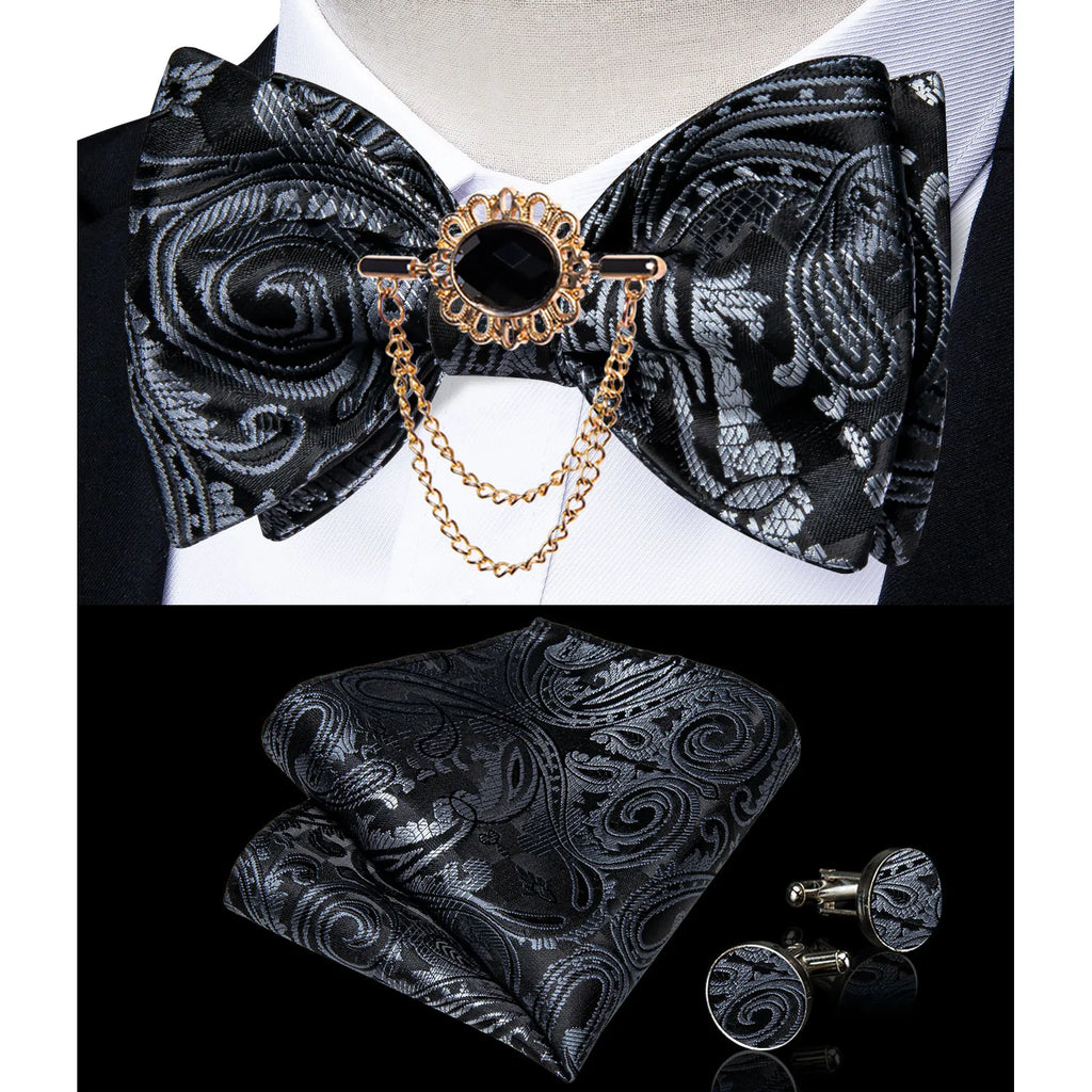 DiBanGu men's pink solid bow tie set with pocket square and cufflinks, ideal for wedding attire, shown on a display.