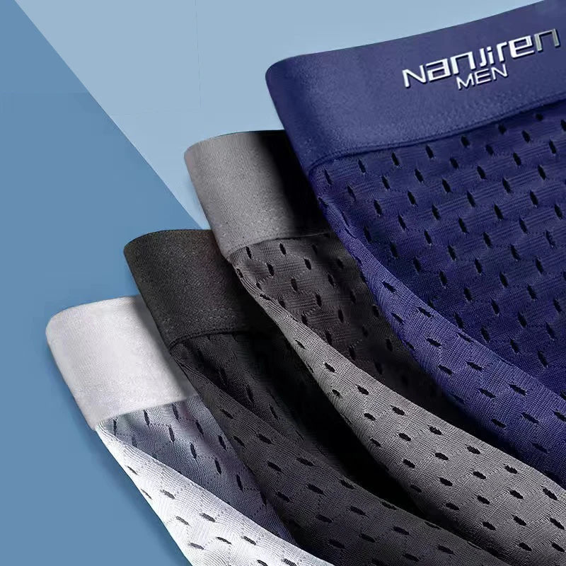 Showlu men's ice silk boxer shorts with breathable mesh polyester fabric, designed for comfort and lightweight wear.
