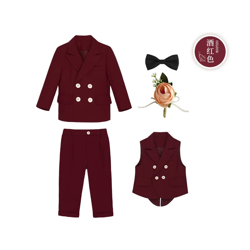 Children's burgundy formal suit set with jacket, pants, and vest for boys, ideal for birthdays and special occasions.