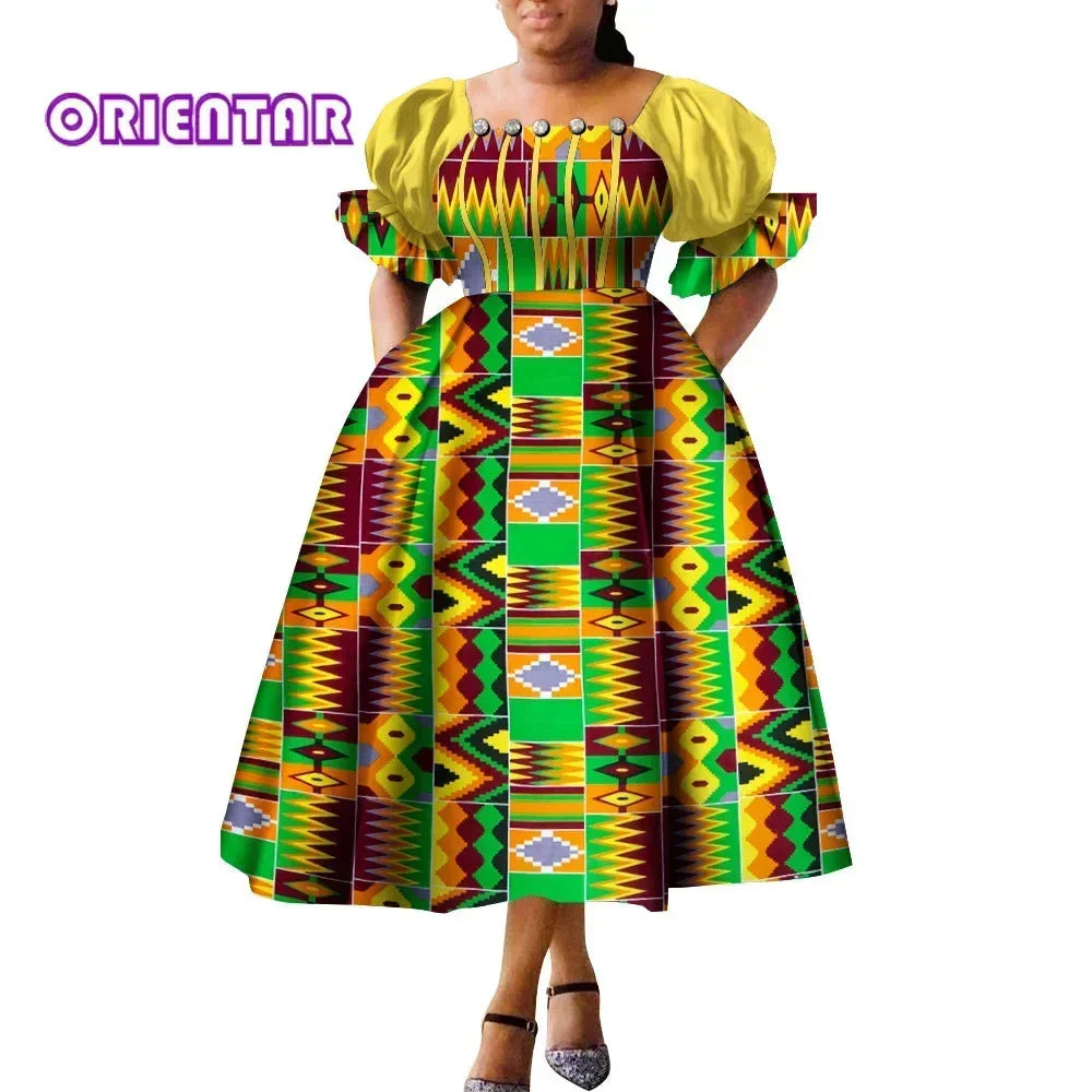 African print puff sleeve high waist Ankara cotton gown by SHOWLU FASHION STORE, featuring vibrant patterns and elegant design.