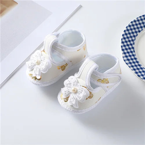 Soft cotton baby first walkers shoes for boys and girls, showing a cute pair of newborn shoes from SHOWLU FASHION STORE.