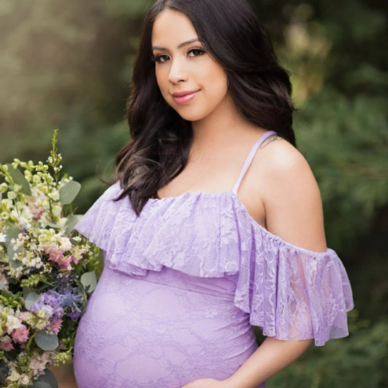 Pregnant woman wearing Showlu Fashion long sleeve lace Christmas dress for baby shower and photo shoot.
