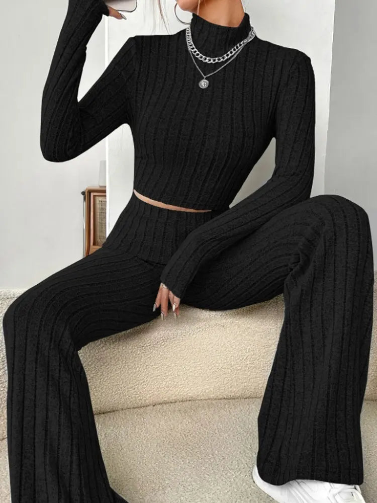 Women’s autumn winter streetwear set with solid color round neck tops and loose pants, casual sporty two-piece by Showlu Fashion.