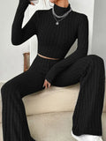 Women’s autumn winter streetwear set with solid color round neck tops and loose pants, casual sporty two-piece by Showlu Fashion.