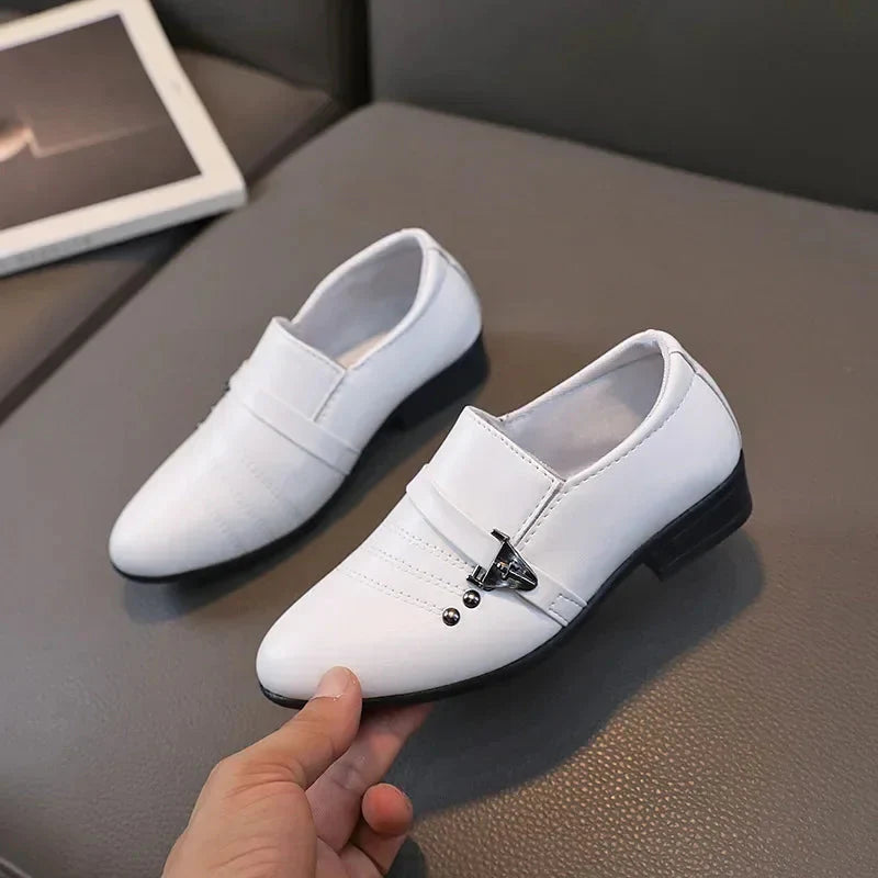 Showlu boys leather loafers featuring classic design, suitable for formal weddings and school parties, with polished finish and comfortable sole.