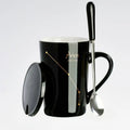 Showlu 12 Zodiac Signs ceramic coffee mug with lid and spoon, black color, featuring zodiac symbols and a modern design.