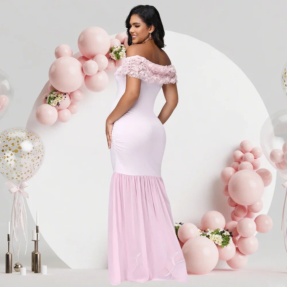 Showlu Maternity floral off-shoulder chiffon gown with split hem, flowing fabric, perfect for expecting mothers and special occasions.