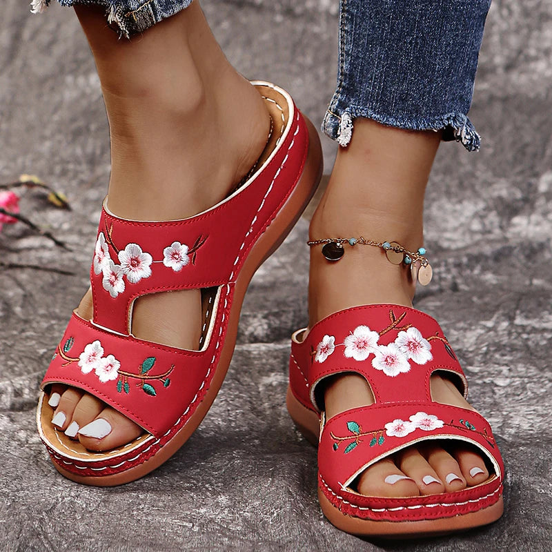 SHOWLU Women's embroidered flower leather wedge sandals with summer-style design, featuring floral embroidery and comfortable wedge heel.