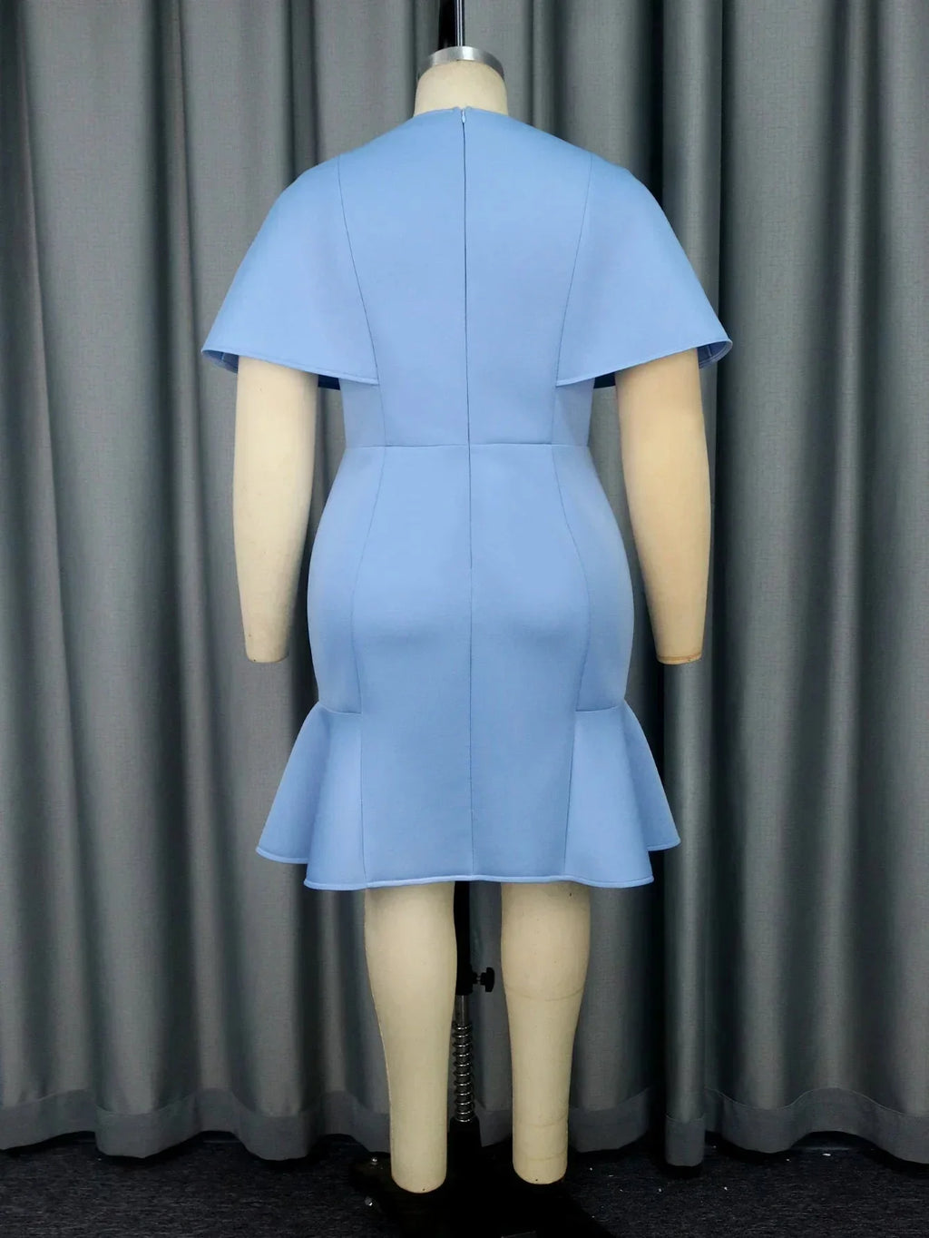 Aimei blue ruffle bodycon mini dress with slim fit and round neckline, perfect for party occasions, shown on a model.