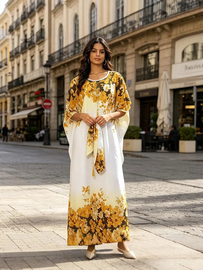African dress for women, traditional Dashiki Ankara gown with long sleeves and vibrant patterns, Muslim Kaftan style from Showlu Fashion