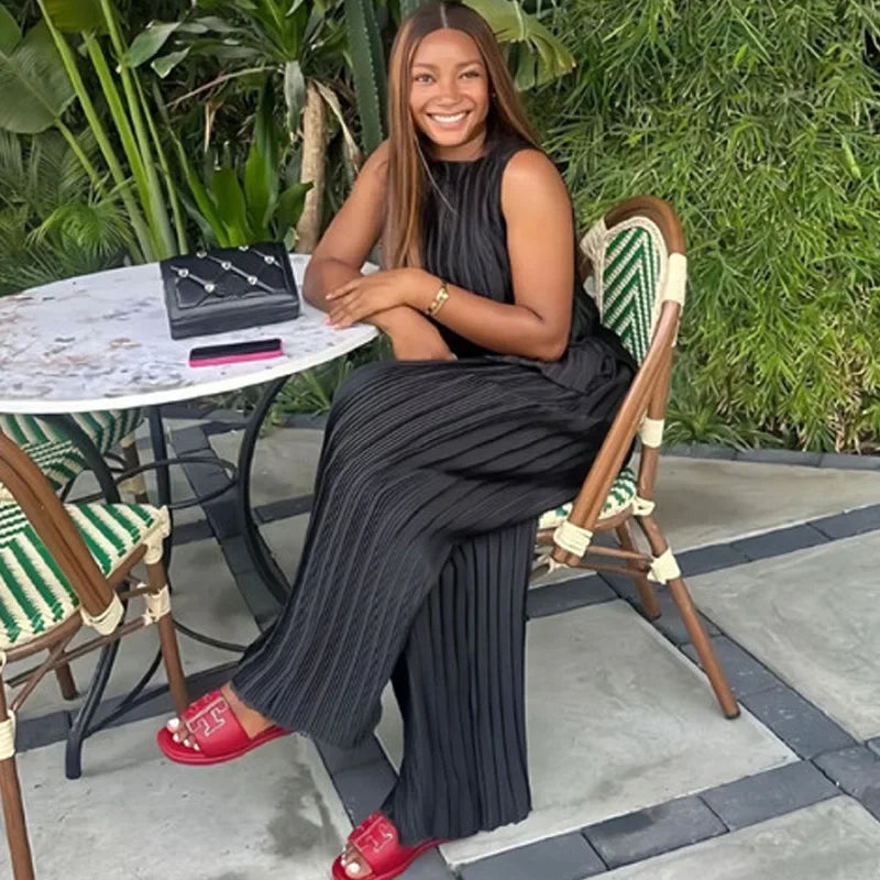 Women's sleeveless pleated top and wide-leg pants set by SHOWLU FASHION, featuring a stylish two-piece design with pleats and a comfortable fit.