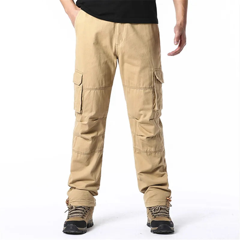 Men's cotton cargo pants by SHOWLU FASHION STORE, loose fit tactical jogging overalls with multiple pockets and durable fabric.
