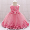 Baby girl white tulle flower dress by Showlu Fashion Store, perfect for baptism or 1st birthday celebrations.