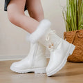 Girls winter snow boots by JGSHOWKITO featuring mid-calf length, PU leather material, and decorative bows.