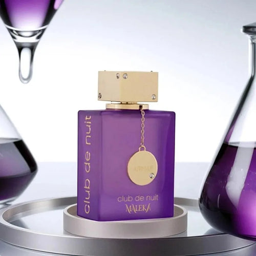 Unisex Armaf Club De Nuit Maleka Pheromone Perfume 100ml bottle with elegant packaging, showcasing the gourmand fragrance.