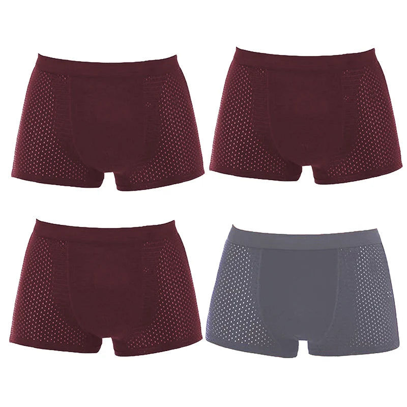 Set of four men's bamboo boxer briefs with breathable mesh pouches by Showlu Fashion Store, featuring comfortable, eco-friendly fabric.