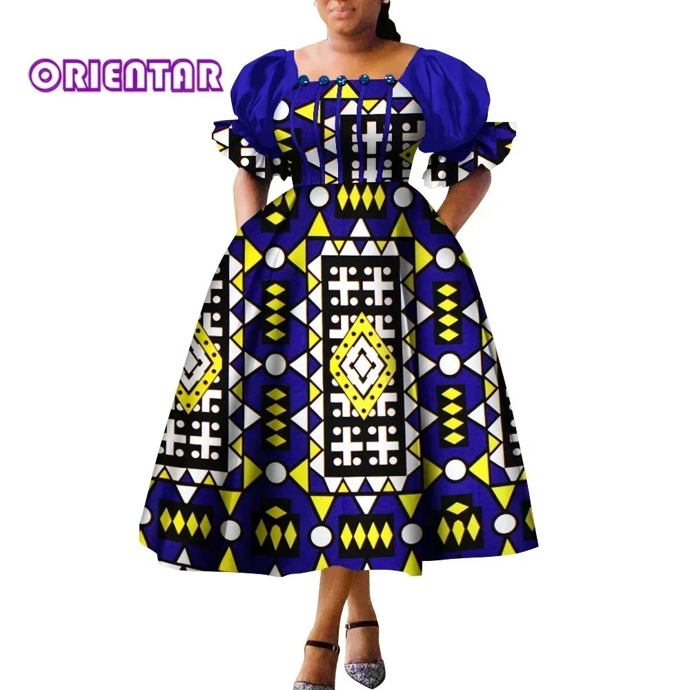 African print puff sleeve high waist Ankara cotton gown by SHOWLU FASHION STORE, featuring vibrant traditional patterns and elegant design.