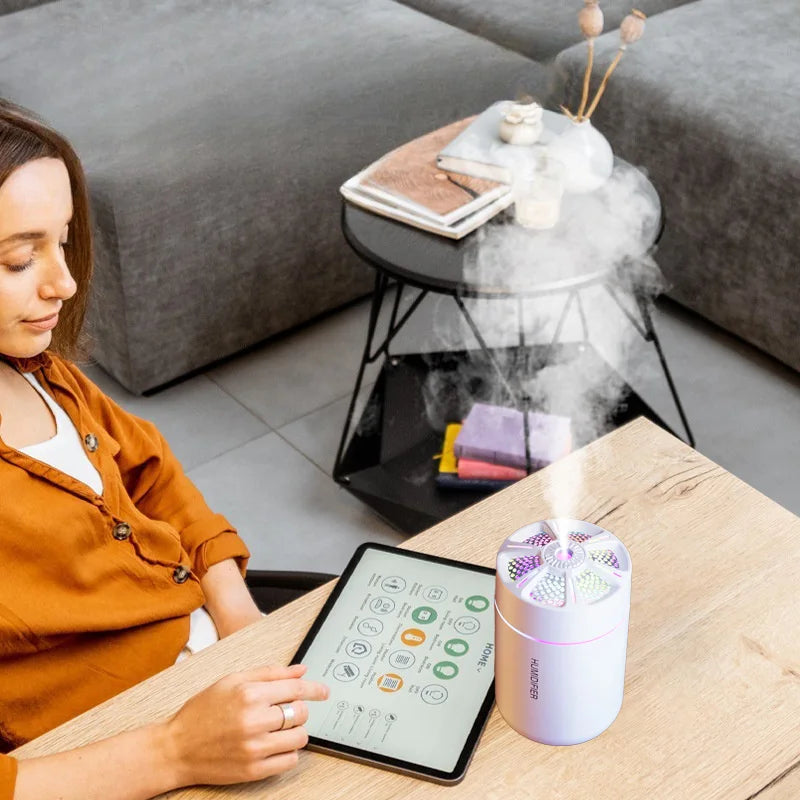 Showlu Smart General mini USB humidifier in white, compact design with mist outlet and power button for portable humidification.