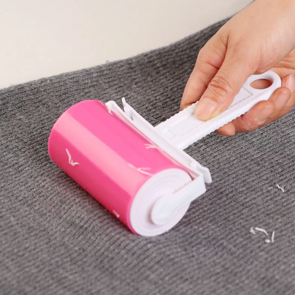 Showlu Smart General Pet Hair Roller Pro with reusable adhesive sheets for removing pet hair from furniture and clothing.