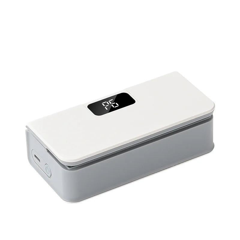 Showlu Smart General mini bag sealer in use, sealing plastic food bags for freshness and storage.