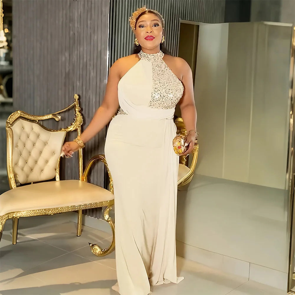 Elegant African party dress for women, plus size maxi gown with sequins, dashiki style, suitable for wedding or evening events.