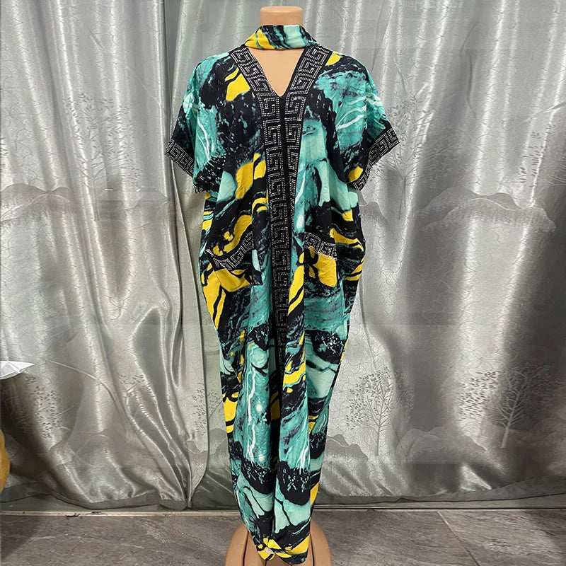African dress for women, traditional dashiki Ankara gown with long sleeves, vibrant Muslim kaftan maxi robe from Showlu Fashion.