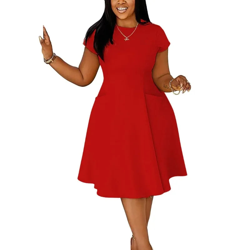 Plus size midi dress for women by Showlu Fashion, short sleeve, casual street style, oversized fit, perfect for spring and summer.