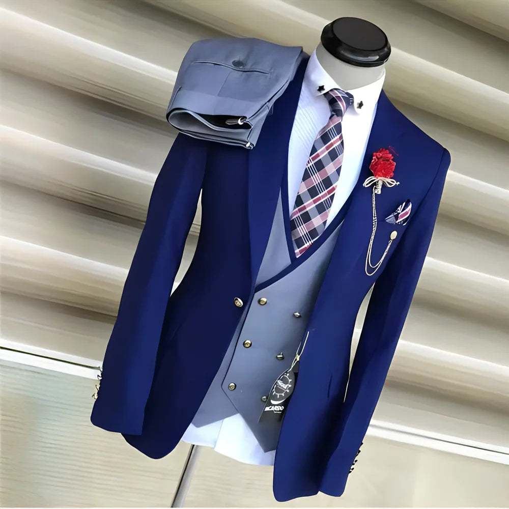 Royal blue men's 3-piece suit with yellow tuxedo jacket, pants, and vest, perfect for wedding or formal occasions.