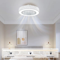 A white flush mount ceiling fan with a decorative floral pattern and integrated LED light.