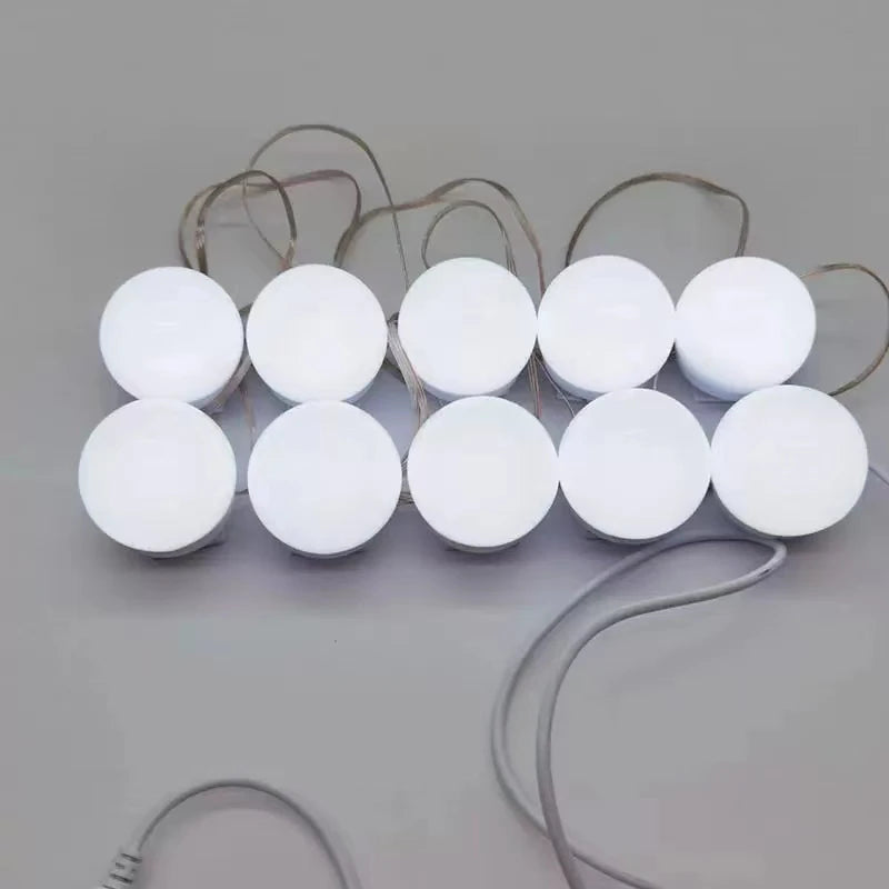 Dimmable USB LED vanity mirror lights by Pampsee, shown installed around a makeup mirror with adjustable brightness.