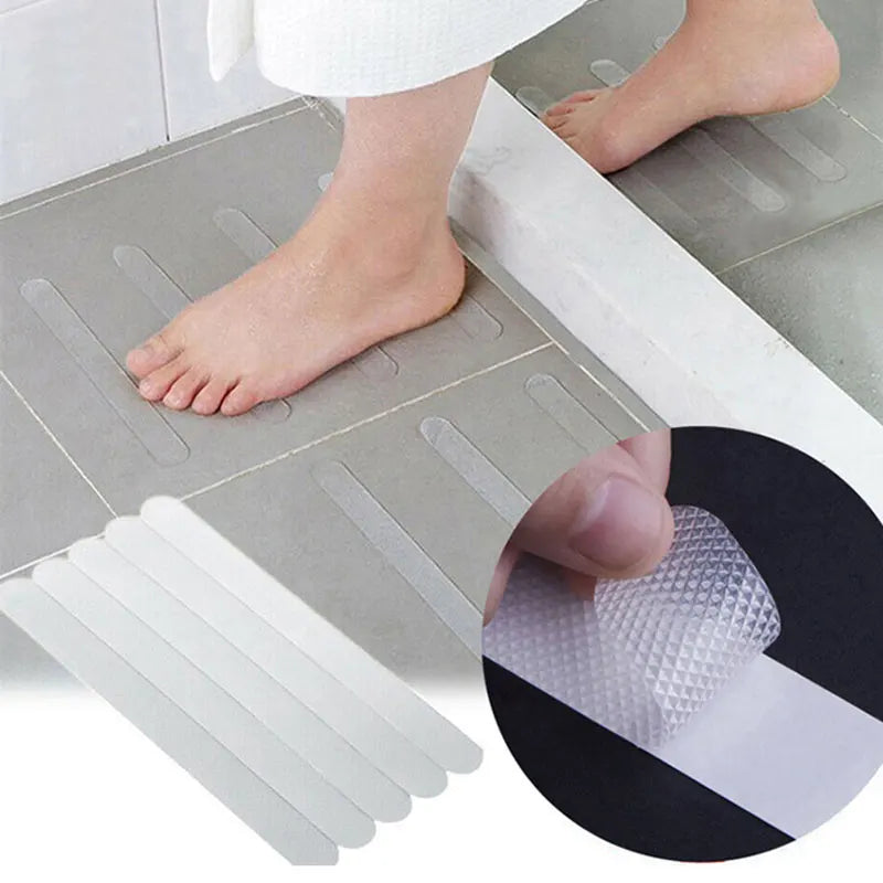 Showlu Smart General anti-slip shower stickers on a bathroom floor for improved safety and slip resistance in wet conditions.