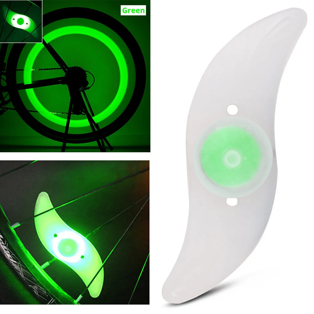 Showlu Smart General bicycle spoke LED wheel light flashing on a bike tire, enhancing visibility and safety during rides.