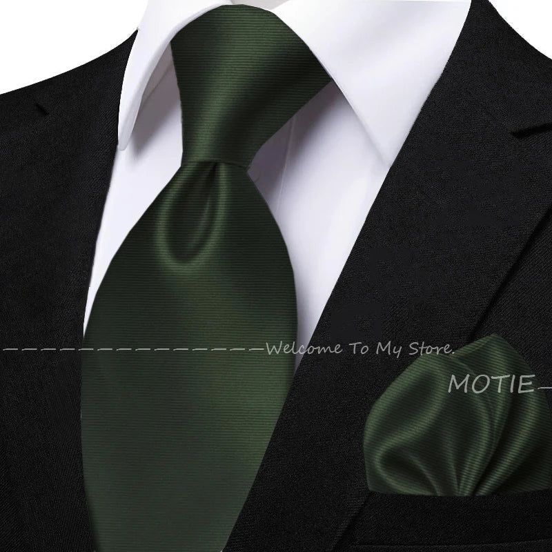 Men's sage green tie set with pocket square, flower brooch, cufflinks, and collar accessory for wedding or daily wear.