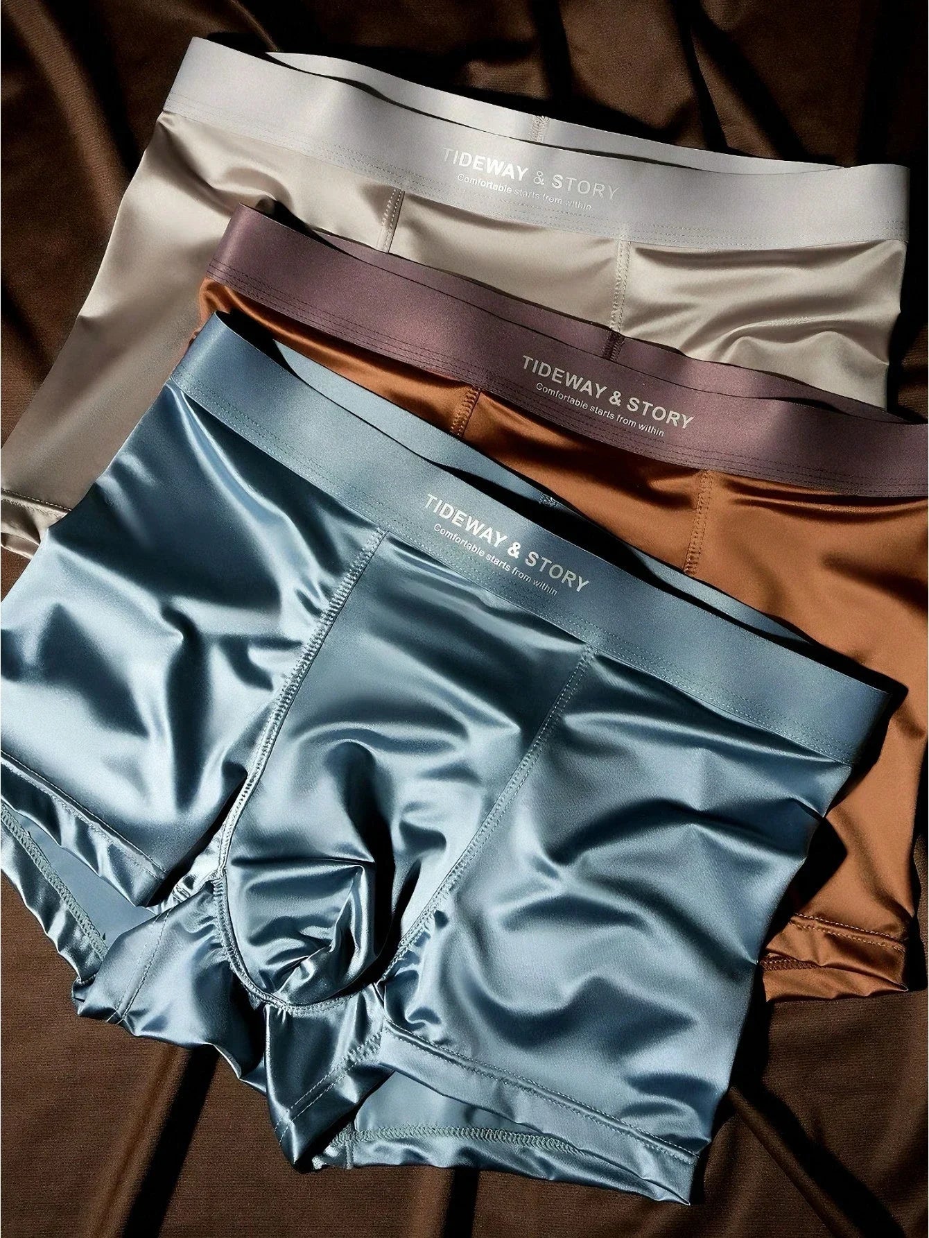 Showlu men's ice silk boxer shorts with breathable satin stretch fabric, featuring a smooth, comfortable fit for everyday wear.