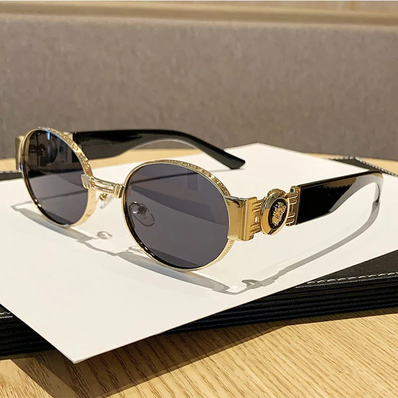 Unisex UV400 fashion oval frame sunglasses with mirrored polarized lenses for stylish eye protection.