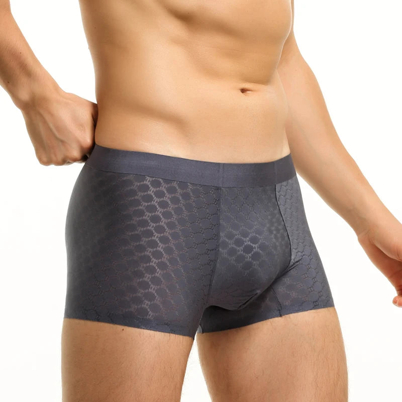 Showlu Fashion men's ice silk boxer briefs, lightweight breathable seamless summer underwear with a slim fit and comfortable design.