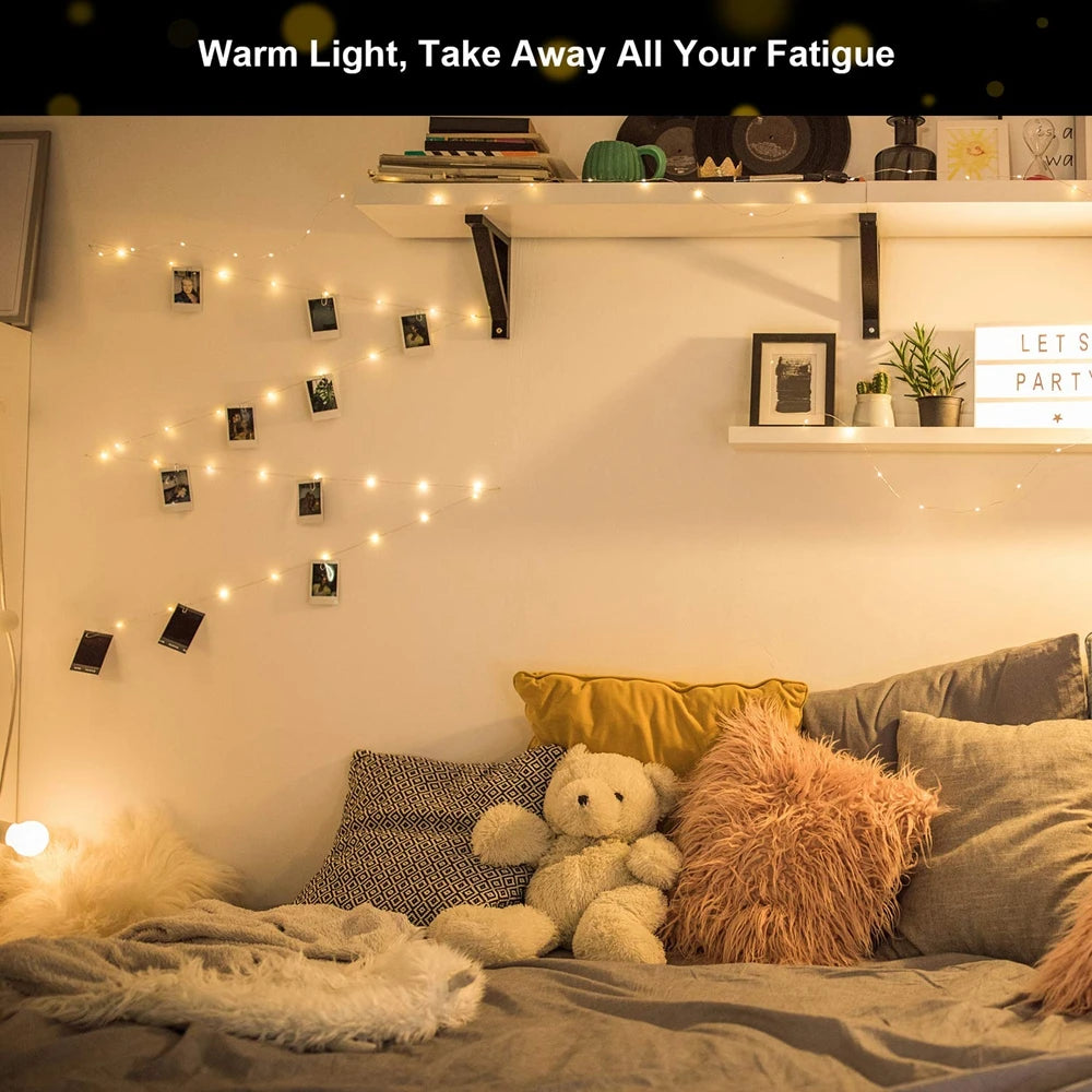 Showlu Smart General LED photo clip string lights hanging with clips and glowing softly for decorative lighting.