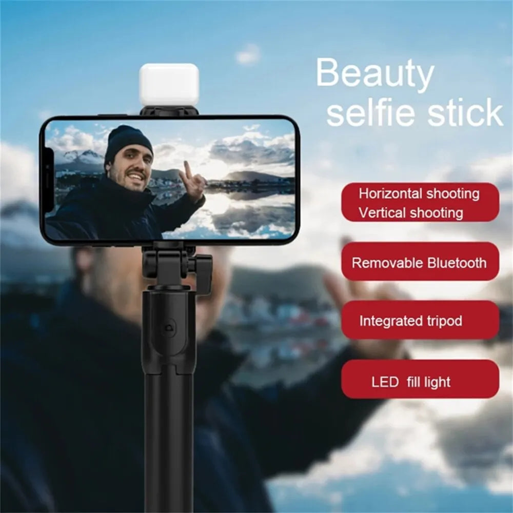 Showlu Fashion wireless selfie stick tripod with Bluetooth remote, LED fill light, phone holder, ideal for live streaming and selfies.
