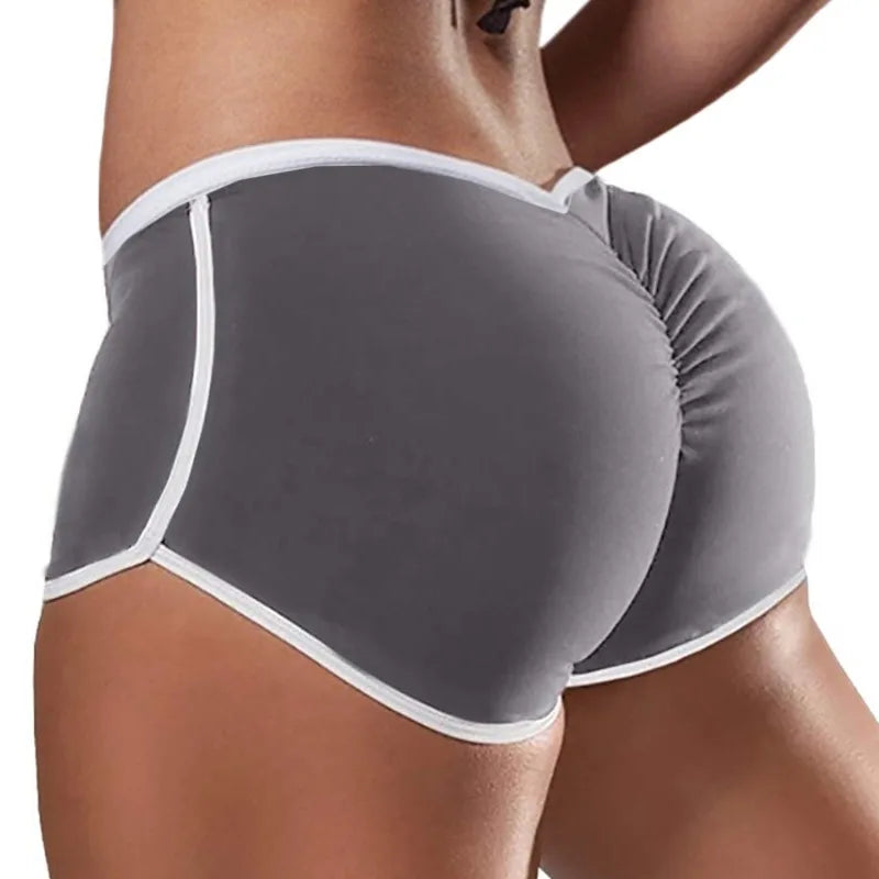 SHOWLU Women's yoga sports shorts in polyester spandex, featuring a comfortable gym workout pant design with a sleek, fitted look.