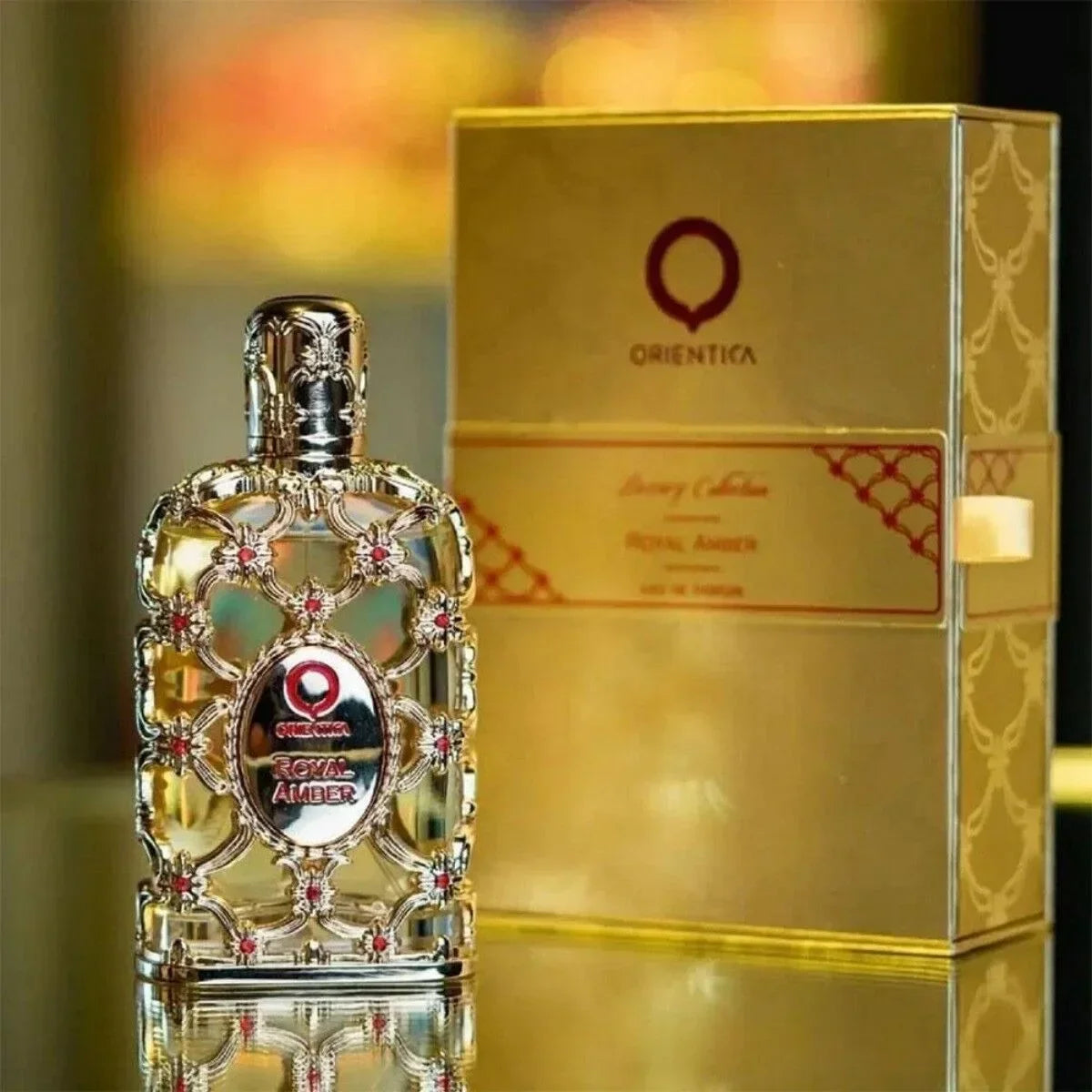 Unisex DJBS Royal Amber Eau De Parfum bottle with floral fragrance notes, 2.7 oz, elegant glass design.