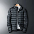 White SHOWLU men's ultra-light waterproof duck down jacket with padded insulation, ideal for cold weather outdoor wear.