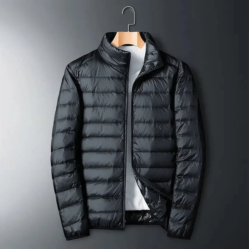 White SHOWLU men's ultra-light waterproof duck down jacket with padded insulation, ideal for cold weather outdoor wear.