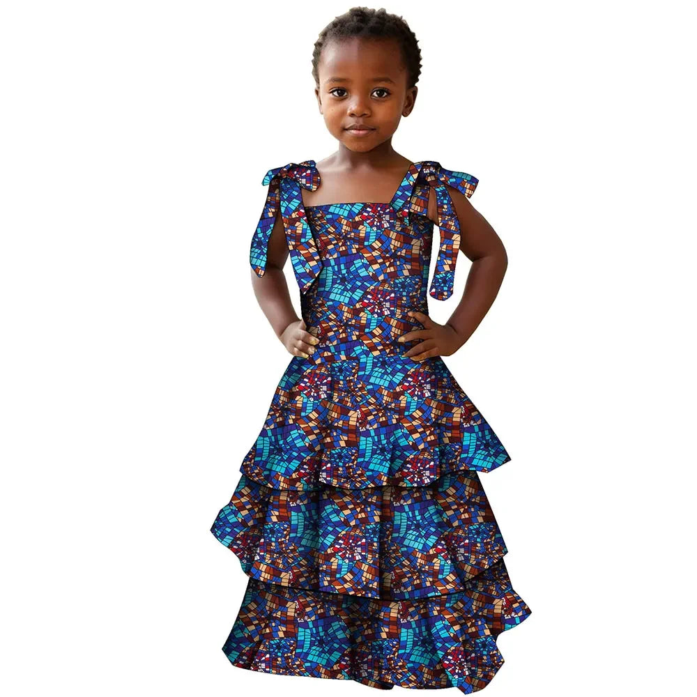 African print cotton girls' party dress in Bazin Riche style with vibrant patterns, perfect for special occasions and celebrations.