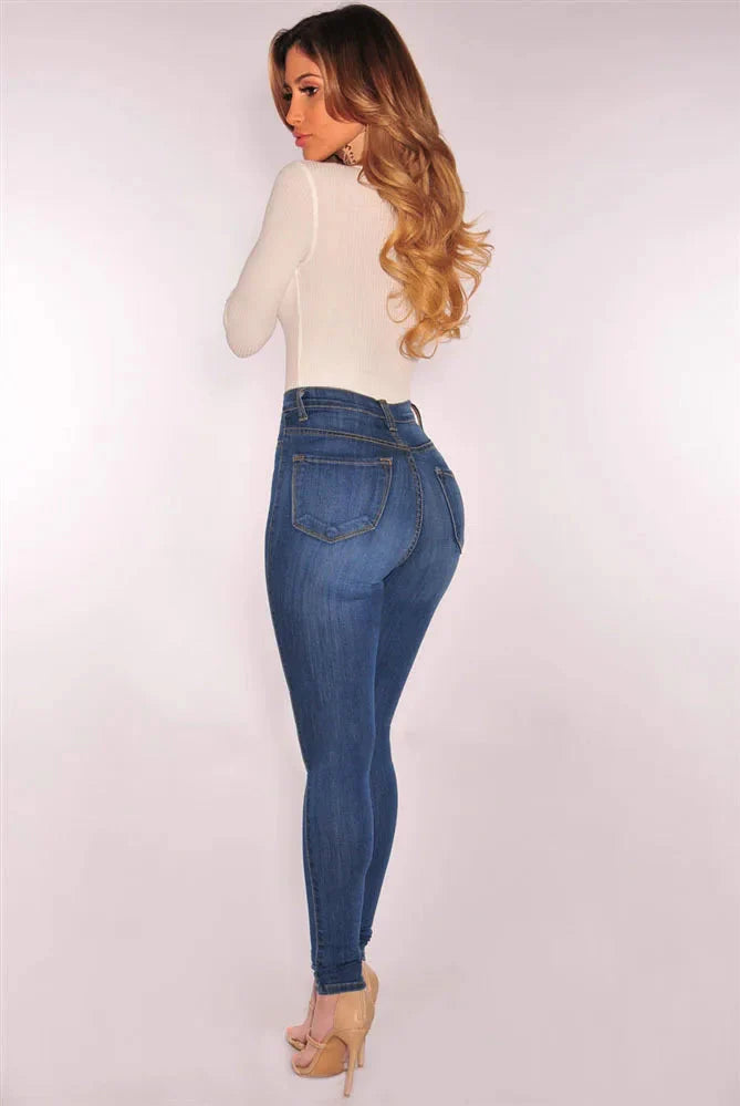 SHOWLU Women's high waist skinny jeans made of cotton denim, slim fit design with front pockets and classic blue color.