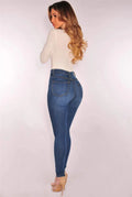 SHOWLU Women's high waist skinny jeans made of cotton denim, slim fit design with front pockets and classic blue color.